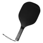 Black paddle with a textured handle and a wrist strap, isolated on a white background.