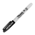 A black and white Sharpie marker with a cap labeled HITACHI.