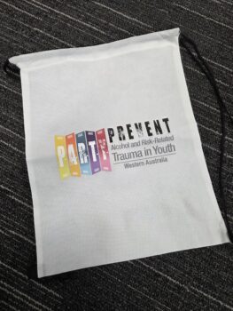White drawstring bag with PARTY Prevent Trauma in Youth logo, great for choosing between products.
