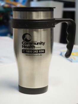 A stainless steel travel mug—advise clients when choosing products with your logo and number.