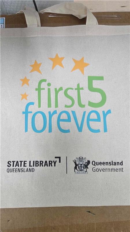 A size-free tote bag with first 5 forever and State Library Queensland logos—great event gift ideas.