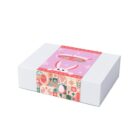 White gift box with a pink, bunny-themed decorative sleeve and Some bunny gift set text.