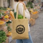 Woman carrying Mecha Jute Tote Bag with veggies and bread at an outdoor market.