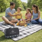 Family enjoying lunch on Classic Mansfield Picnic Blankets, sharing food and smiles outdoors.
