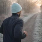 Jogger at sunrise stays warm in Stanton Colourful Logo Beanies and a cozy jacket.