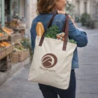 Woman carries groceries in a Mario Personalised Tote Bag on a city street.
