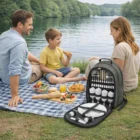 Family enjoys a picnic by the lake with Boston Personalised Logo Picnic Sets on a blanket.