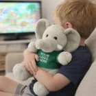 Young boy hugs Elephant Logo Branded Plush Toy—ideal for custom branded promotions.