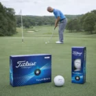 A golfer putts with Titleist Tour Soft Golf Balls and their packaging visible in the foreground.