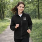 Woman jogging in a Sols North Womens Fleece Jacket featuring Your Logo Here on the chest.