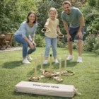 A family smiles outdoors, playing Vortex Ring Toss Games together on the sunny grass.
