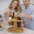 A couple stores bottles on Fizarr Bamboo Wine Racks for stylish kitchen wine storage.