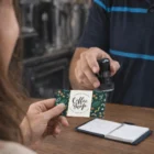 Customers earn rewards by stamping their Loyalty Cards at the counter.