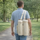 Man walking in park carrying a Single Wine Cooler Bag over his shoulder.