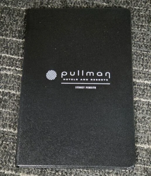Black notebook with Pullman Hotels and Resorts Sydney Penrith logo—ideal for client advice notes.