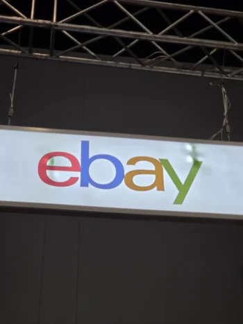 A hanging sign with the eBay logo—order bulk to avoid delays in production.