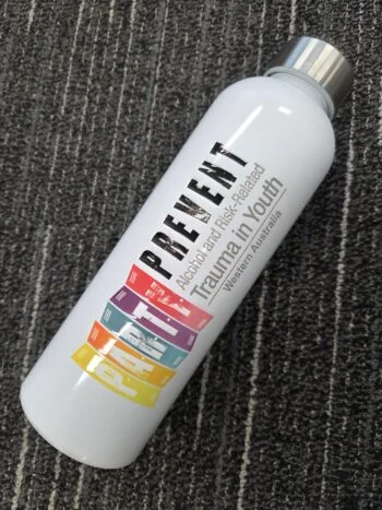 White water bottle with colorful PREVENT Trauma in Youth WA text—great for product selection advice.
