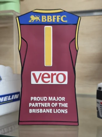 A maroon Brisbane Lions jersey featuring apparel printing and the number 1 on the back.