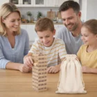 Family plays Jenga Sets In Calico Bags together at a table.
