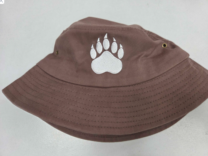 Brown bucket hat with white bear paw print, inspired by Stanmore and Newington College spirit.