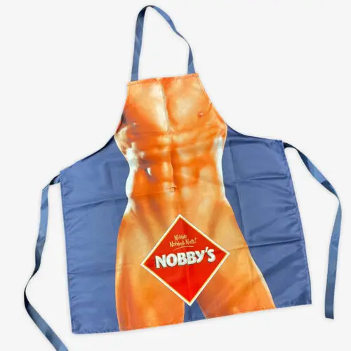 Apron with a printed muscular torso and Nobbys logo—fun promotional merchandise for snack brands.