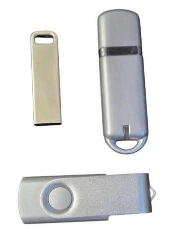 Three USB flash drives with data preloading options arranged on a white background.