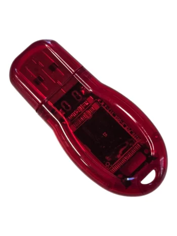 A red USB flash drive with transparent casing, designed for broad compatibility.