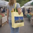 Person at market holds Gusset Bag With Full Colour Print featuring groceries and a church image.