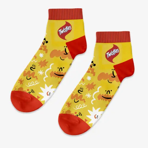 Yellow socks with red toes and cuffs, Cubic Promote snack brands promotional merchandise.
