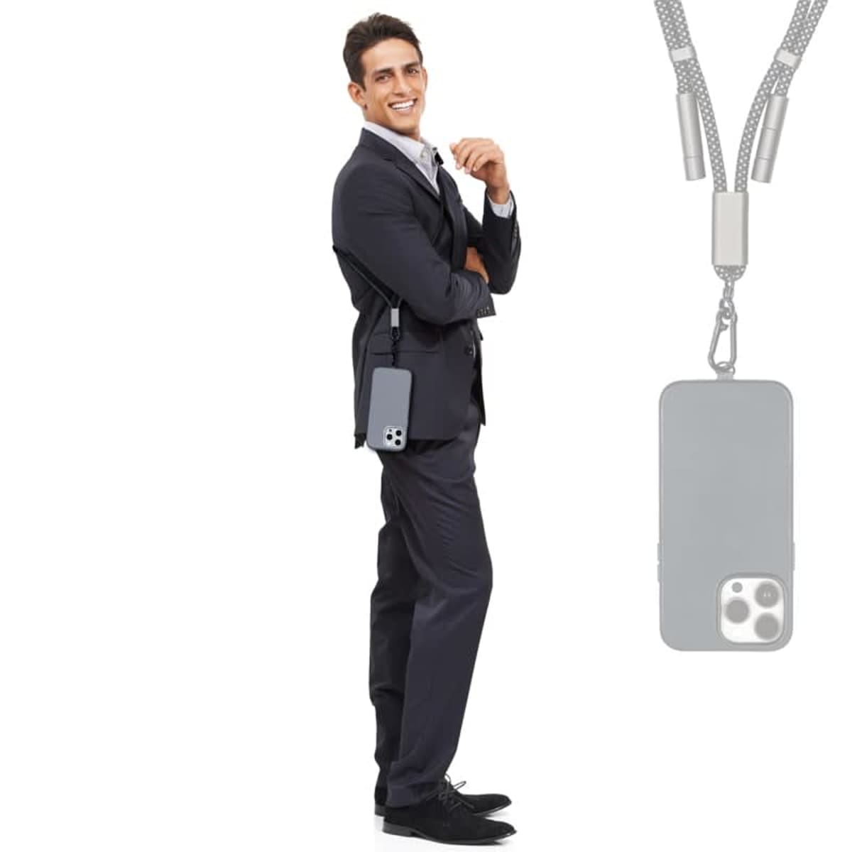 Smiling man in a suit wearing a smartphone on a lanyard around his neck and shoulder.