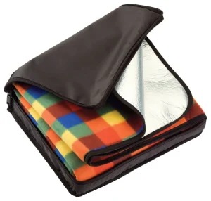 Folded picnic rug in a zippered carry cover