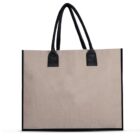 Beige tote bag with black handles and black edging, shown on a white background.