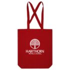 Red tote bag with Hawthorn Hotel & Suites logo and tree graphic in white.