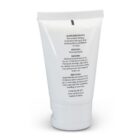 White tube of sunscreen with black text showing active ingredients and application directions.
