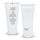 Two white sunscreen lotion tubes, one showing the front label, the other showing the back label.