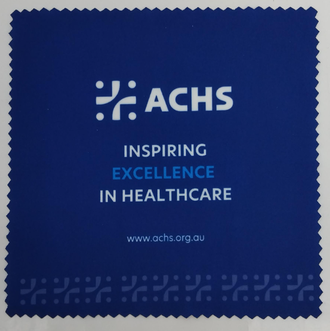 Blue ACHS cloth with Inspiring excellence in healthcare and website link, based in Sydney, NSW.