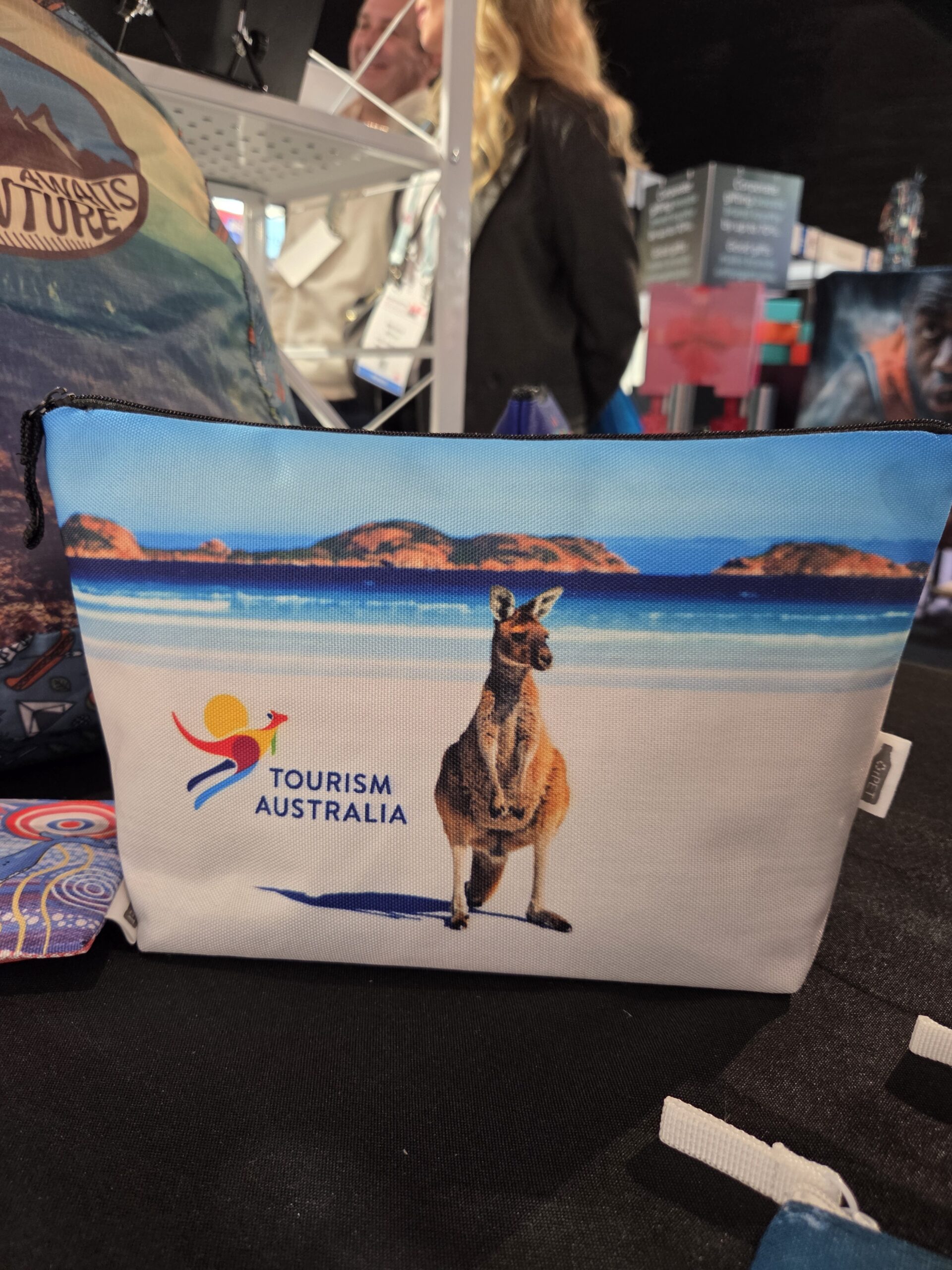 Pouch with a kangaroo and Tourism Australia logo, ideal for job fair giveaways at the beach.