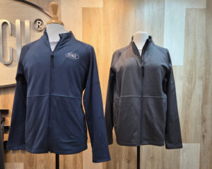 navy and greay jacket on a mannequin