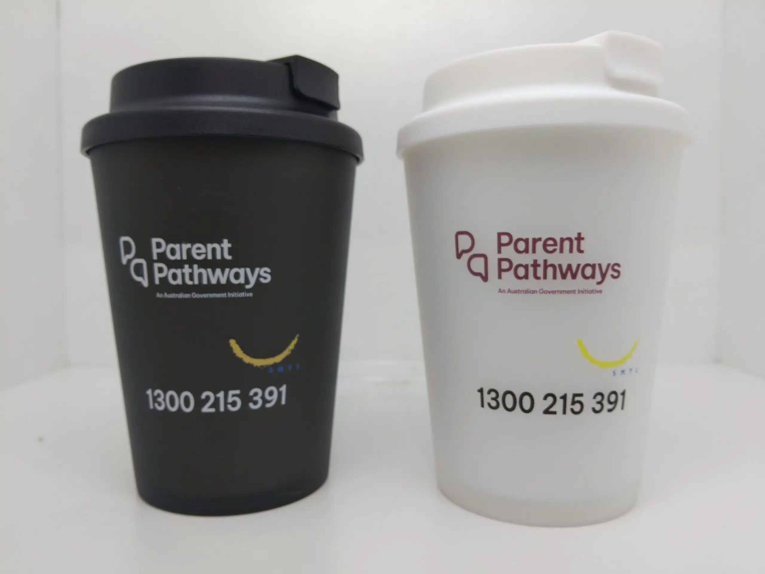 Two reusable cups with Parent Pathways branding for a satisfied client at SMYL.