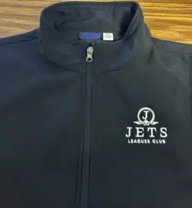 black jacket branded with jets leagues club logo