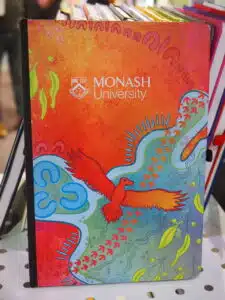 notebook with graphics from monash university