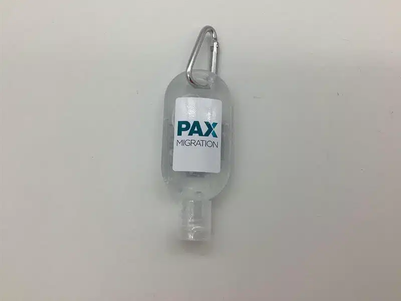 Clear bottle with carabiner, labeled PAX Migration, ideal for wellness items, on white background.