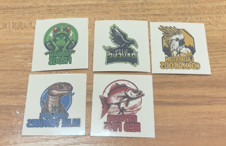Five animal-themed stickers from Kyneton High School: frog, hawk, cockatoo, snake, fish.