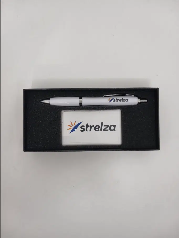 pen and mints on the gift box with logo