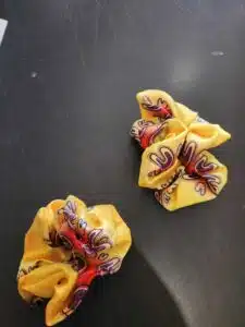 hair scrunchies with branded pattern