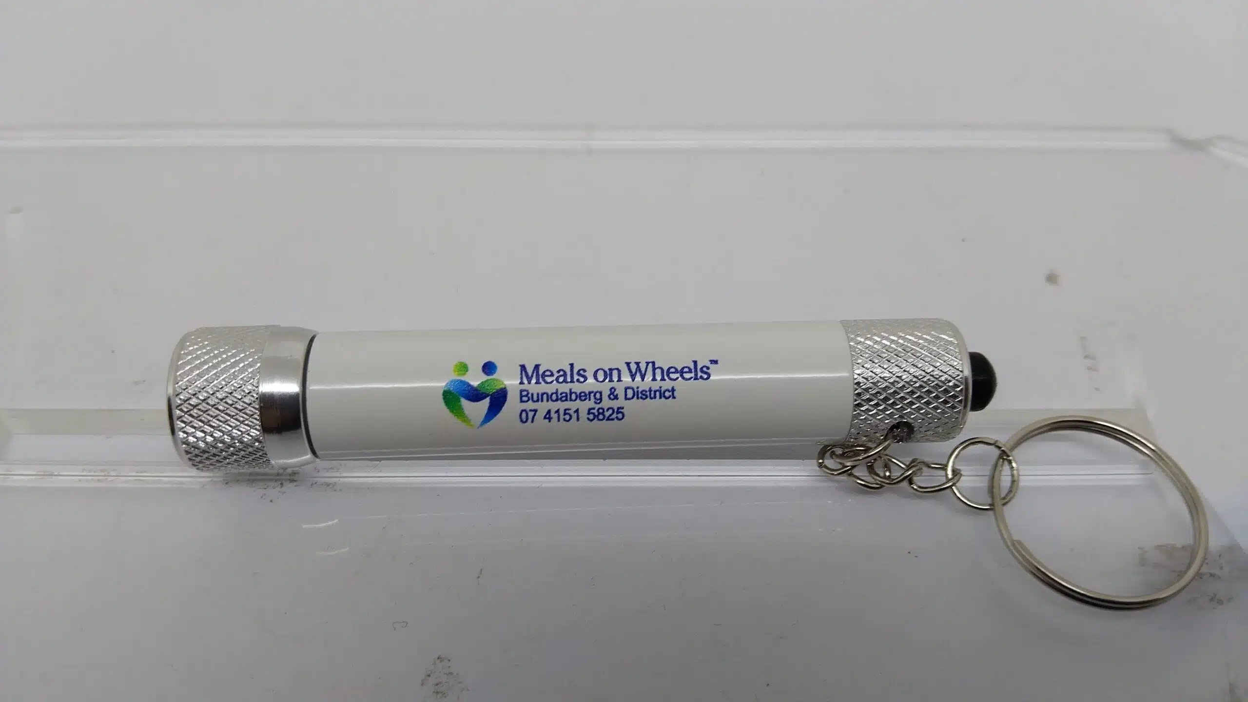 Bundaberg Meals on Wheels branded keyring torch