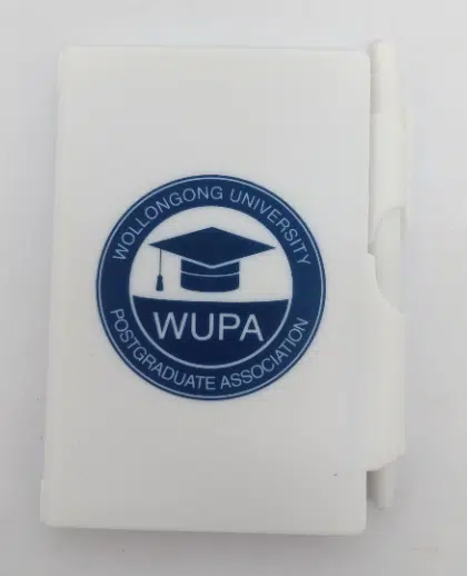 Branded pocket notebook with attached pen