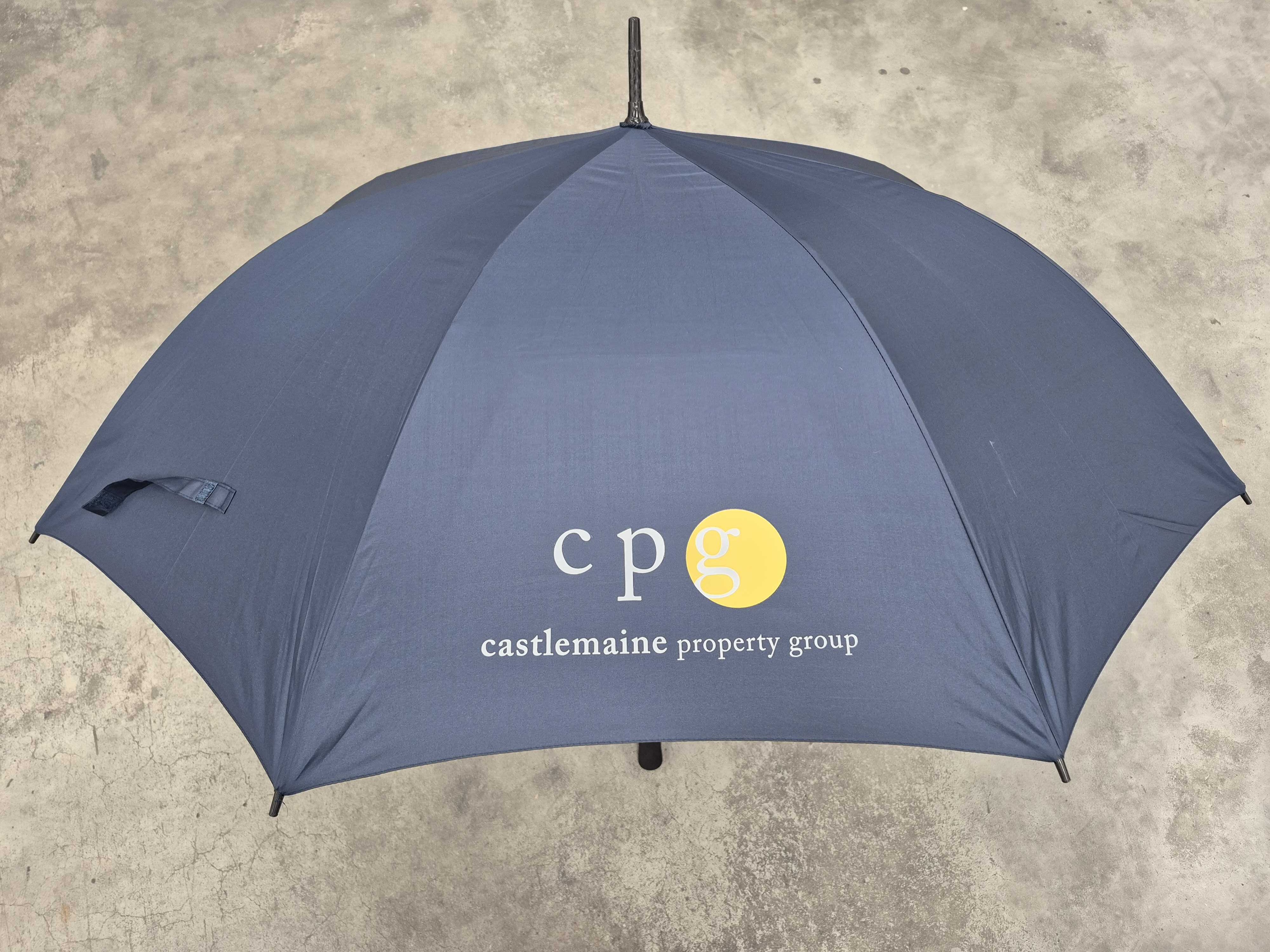 umbrella with Castlemaine Property Group logo