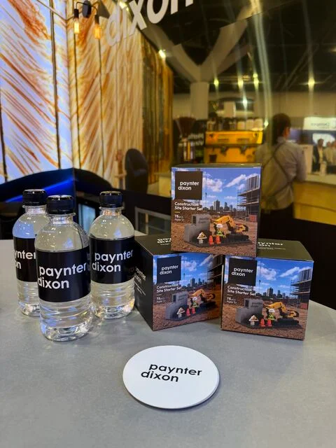 Paynter Dixon branded building bricks, bottled water and coasters