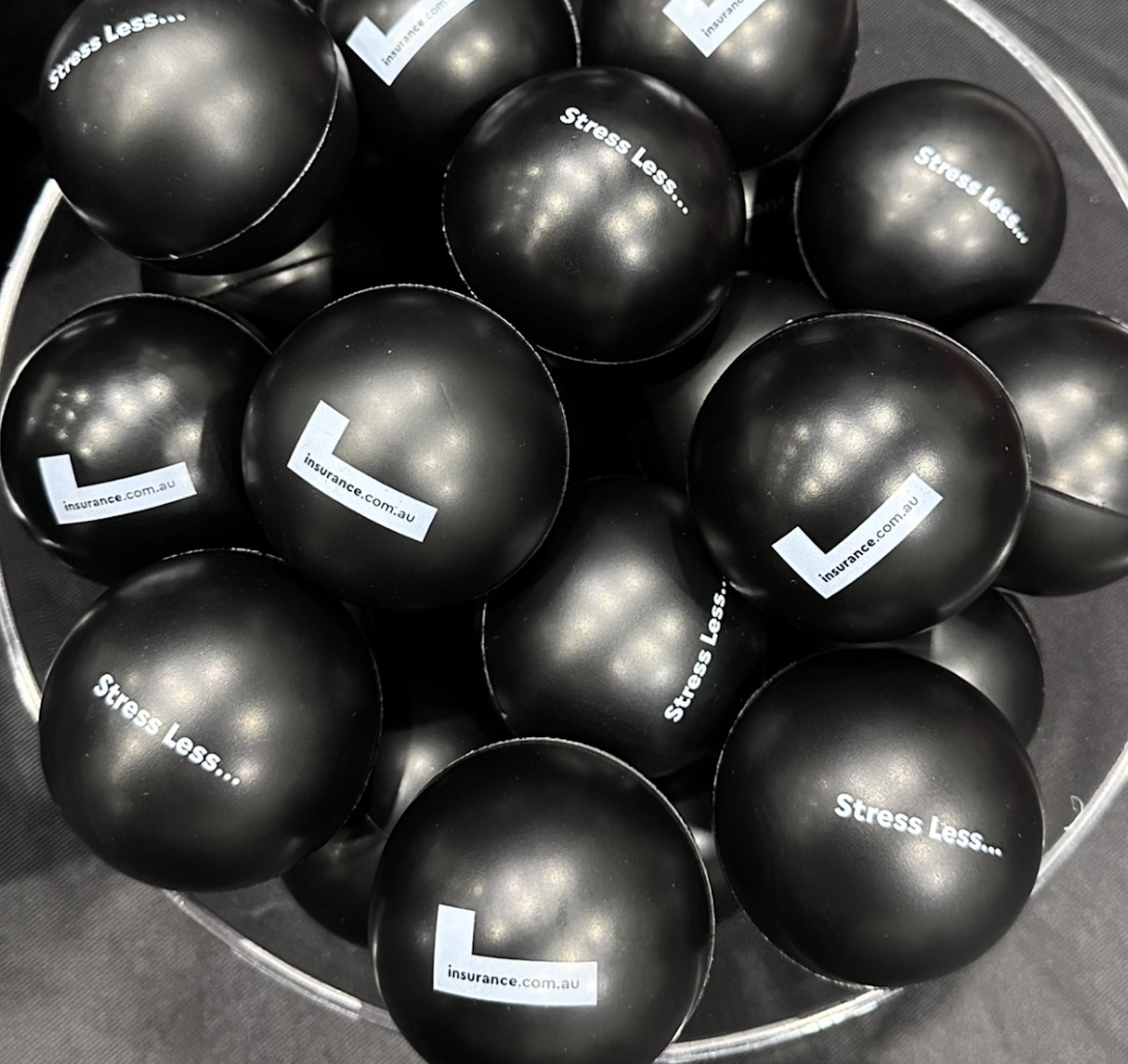 black stress balls with insurance.com.au link